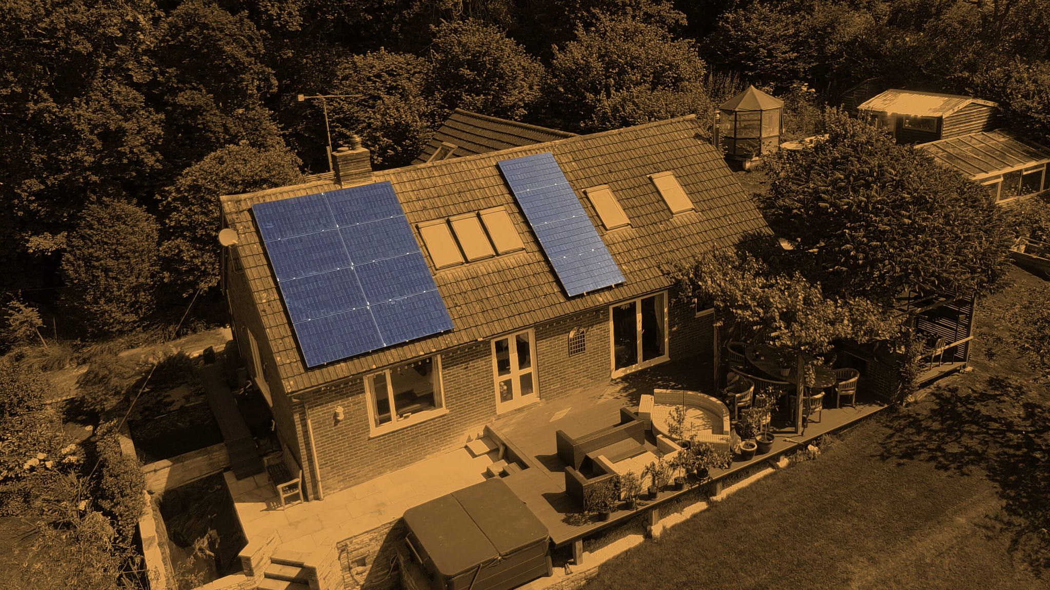 Aerial view of a Sussex house with solar arrays