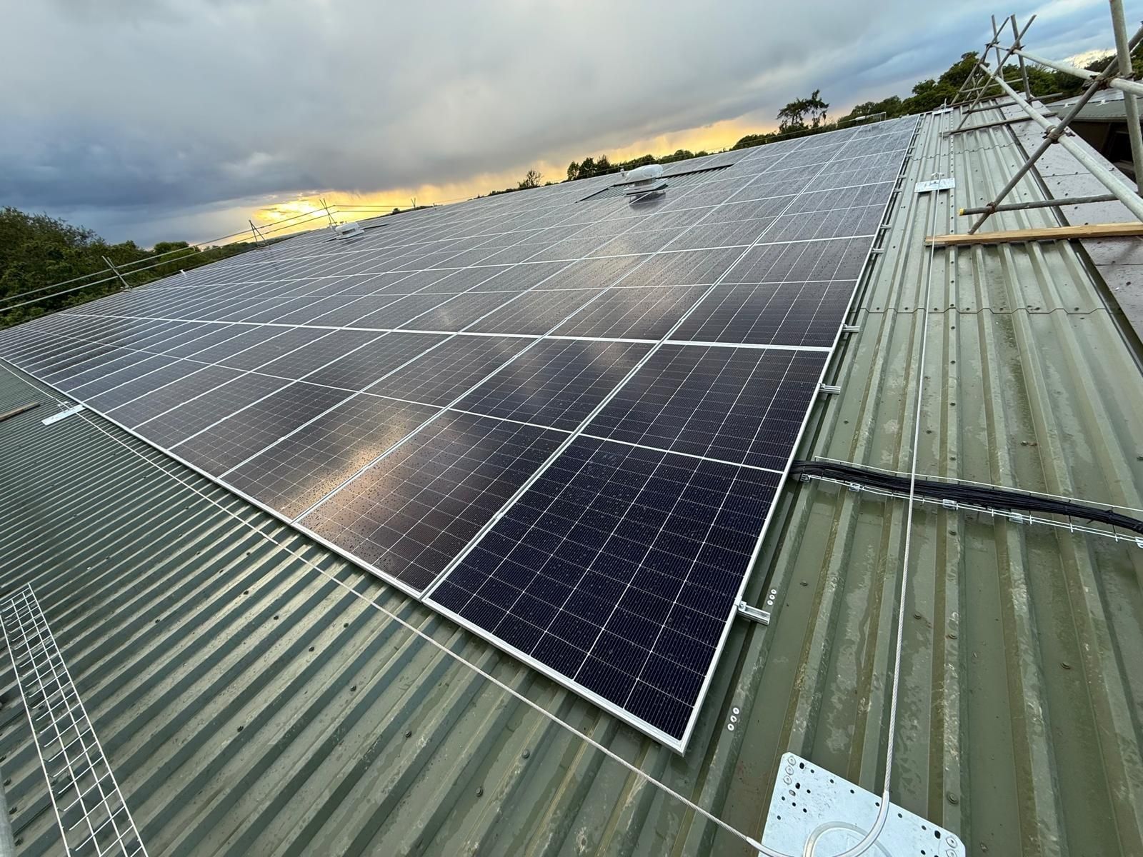 A finished commercial solar array at the end of the day
