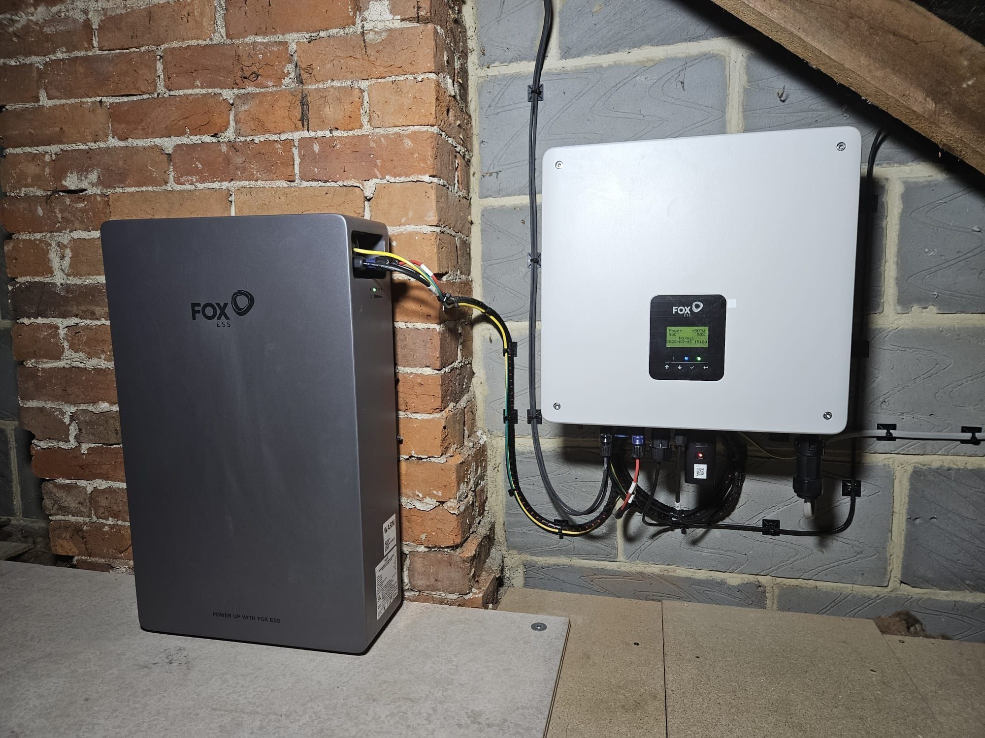 A Fox ESS battery and inverter installed in a loft